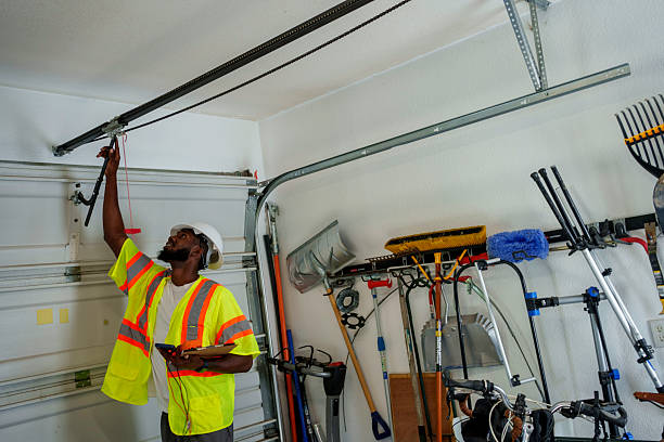 Professional Garage Door Panel Replacement technician working in Franklin County County, NY